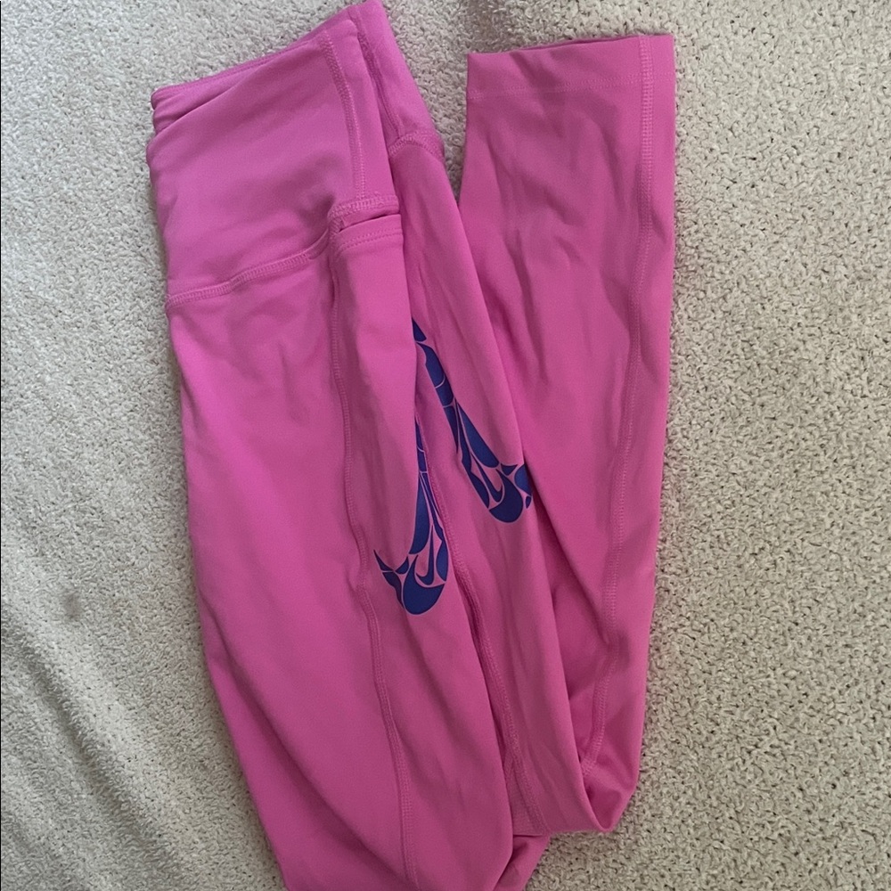 pink Nike leggings with blue swoop!